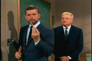 Doing some quick mental math, he realizes that 1 prissy teacher plus 2 feisty seven-year-olds might equal a crush-demolishing meltdown. He invites Julian to dinner.