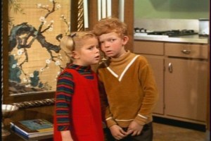 He's yelling at us with his eyes, Buffy whispers to Jody, just before the kids scoop the books up.