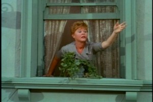 Mike's mother lovingly throws this food to her children from the window.