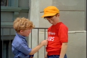 To Sam's credit, he doesn't say, "Get your hands off me, kid." Instead, he invites Jody to try out for the 63rd Street Tigers.
