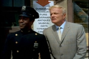 This officer is a Family Affair rarity--an African American who speaks! And more than one line!