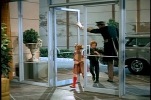 Scotty's distracted, so the kids manage to get the dog past him.