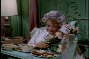 A knock at the door brings Cissy flowers and a nice note from Norton, so she's happy.