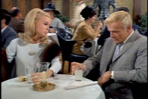 Eventually, she gets him to open up about his worries--he's suddenly decided that New York is no place to raise kids.