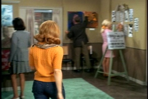 Random fashion note: I like Cissy's casual, exhibit set-up outfit.