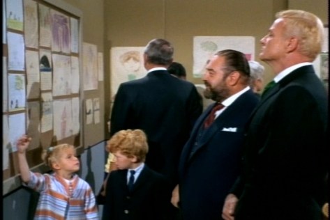 At school, Buffy explains that her picture shows people waiting for a "moon plane" to take off.