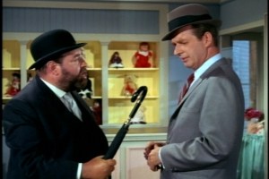 An outraged French tells the man that he's forming a plan to use his "furled umbrella" on him.