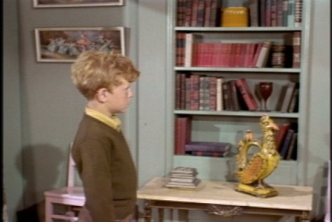 Random Set Design Observation #2: The girls have some dreary-looking books. And what is that yellow thing?!