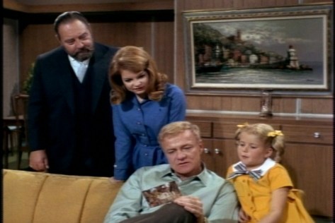 Reading Jody's postcards is apparently a big event for the whole family.