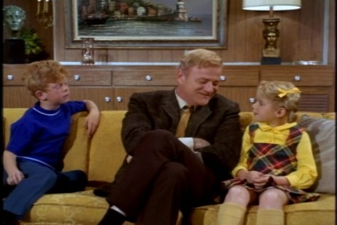 When Bill asks how school is going, the kids fill him in about Miss Evans.