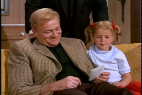 While they laugh over the pictures, Bill and Buffy talk about Jody's current dazed demeanor.