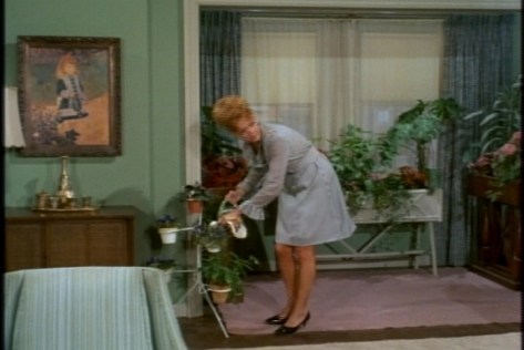 She claims the place is messy--ha! She should see the room where I'm writing this. I do like her Renoir print.