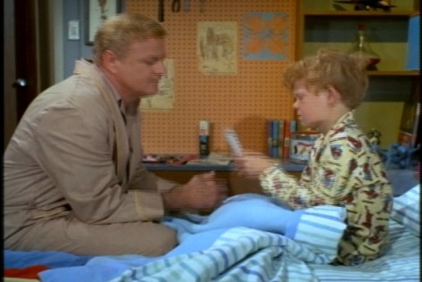 He starts by showing him the picture and explaining why Jody feels so strongly about Miss Evans.