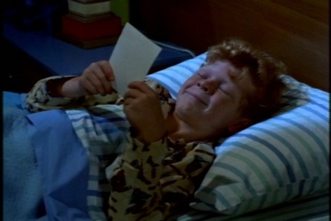 Also sweet: Jody looking at his mother's picture again before he drifts off to sleep.