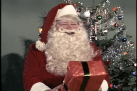 That's the cue for this strangely familiar Santa Claus to arrive.