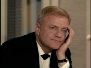 This is how Bill looks as he stares toward Gail's table and grunts minimal responses to Buffy's comments.