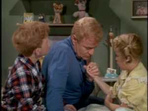 Bill's bedtime sweetness for this week--a kiss on Buffy's hand.