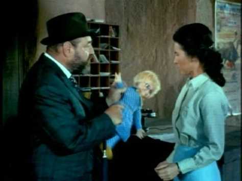 I wonder what this lady makes of a portly English gentleman waving a creepy-looking doll around.