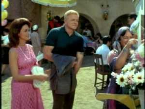 Back in the marketplace, Bill is buying flowers for the "senorita hermosa."