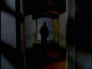 It seems that nothing in their church-going experiences has prepared them for the sight of this hooded figure approaching.