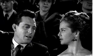 Adam and Libby in their typical attitudes--he worrying about work, she worrying about him.