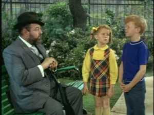 Later, French is waiting around the park for another chance to see Emily.