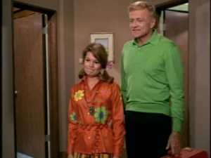 When Cissy is ready to go--and by ready, I mean covered in flower stickers--the hippies are engrossed in a game of jackstraws with the kids.